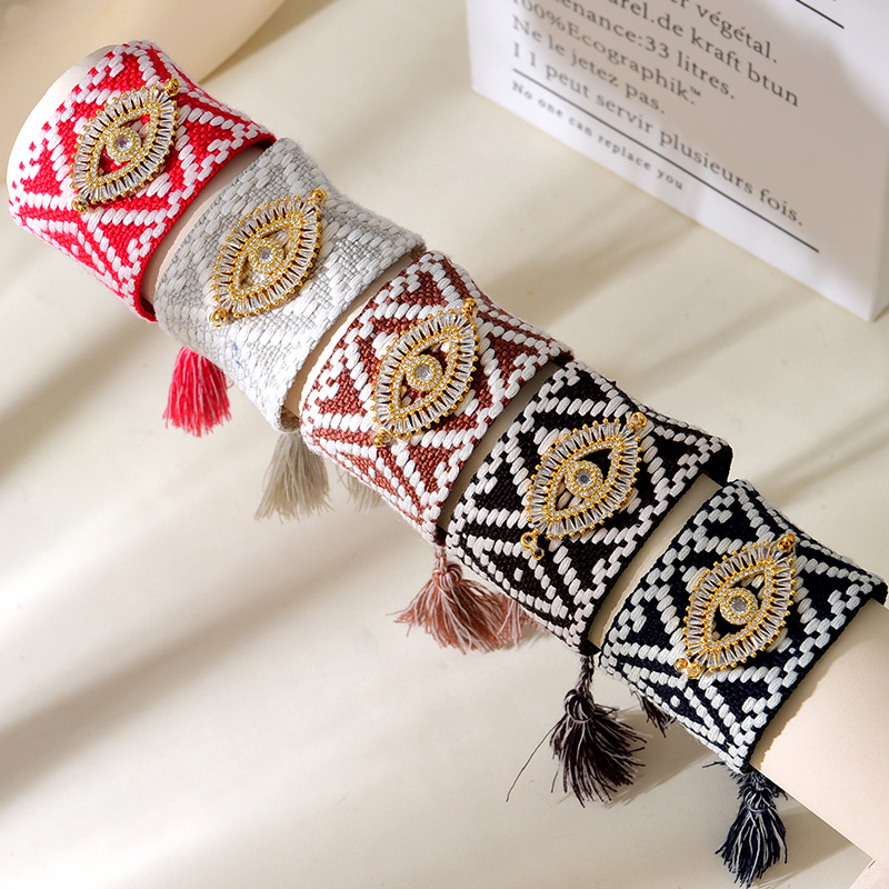 Pulsera De Borlas Trenzadas Con Patrón Geométrico De Ojos De Circonitas Con Incrustaciones De Cobre