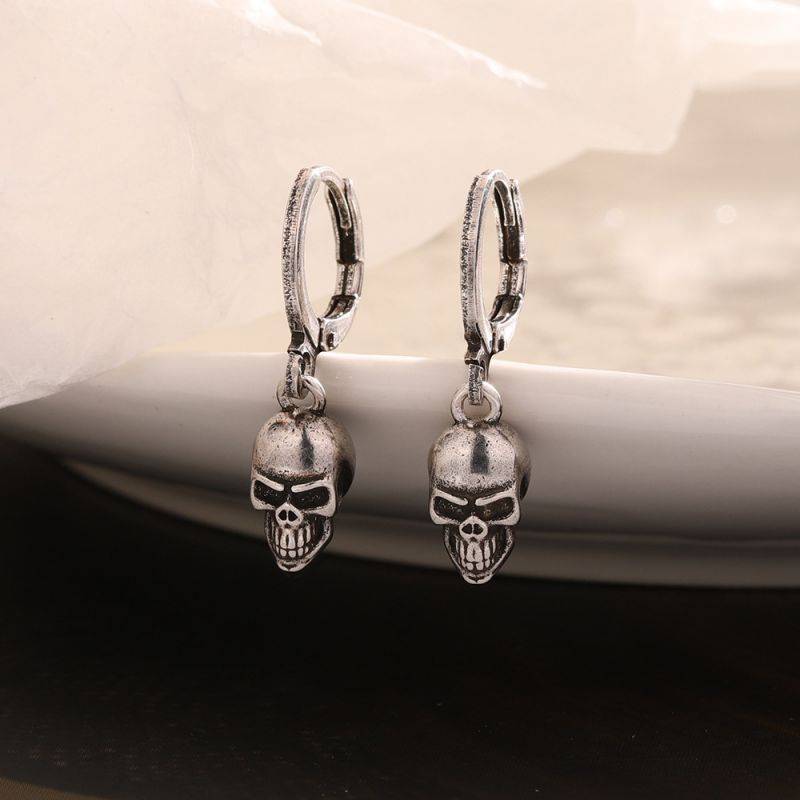 Pendientes De Aro Con Calavera De Cobre