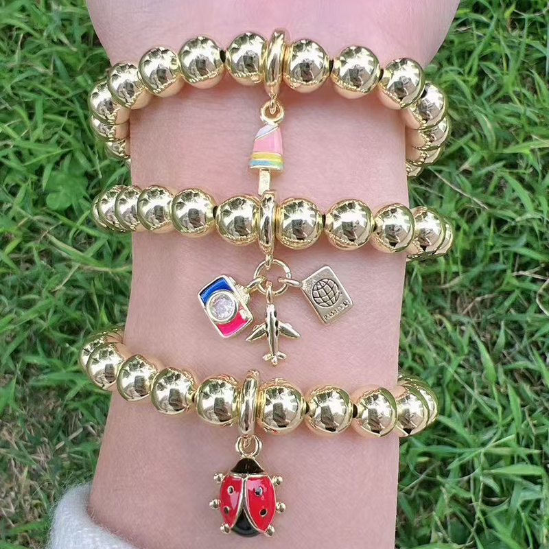 Pulsera De Mariquita Con Cuentas De Cobre Bañadas En Oro