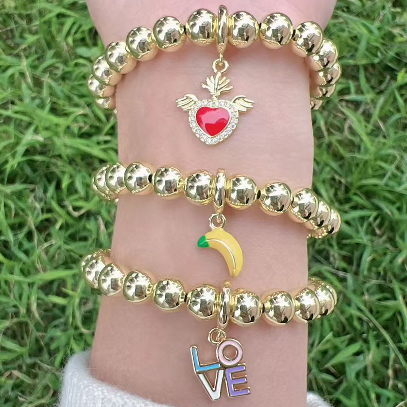 Pulsera De Letras Con Cuentas De Cobre Bañadas En Oro