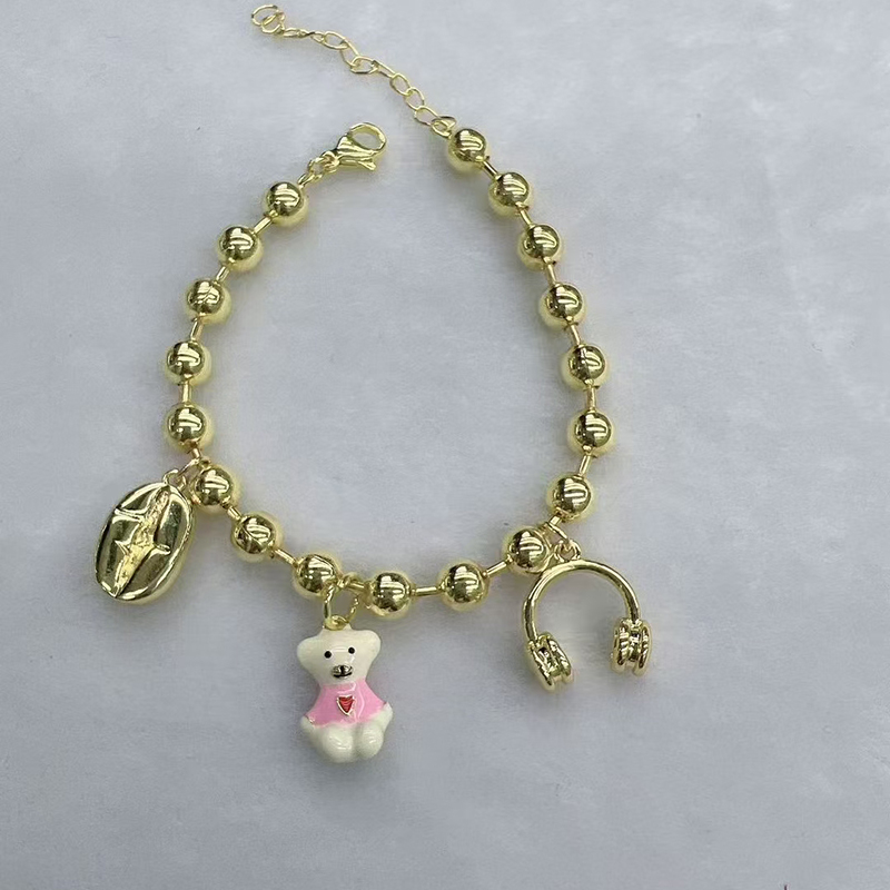 Pulsera De Osito Con Auriculares Bañada En Oro Y Cobre