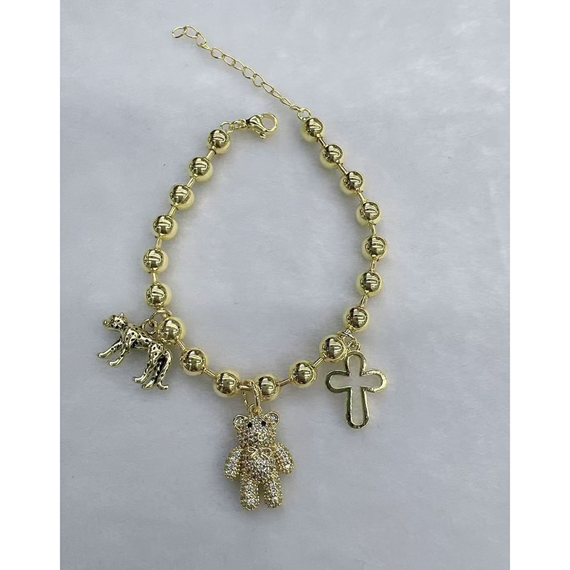 Pulsera De Cobre Bañada En Oro Con Cruz Y Diamantes Oso Y Leopardo