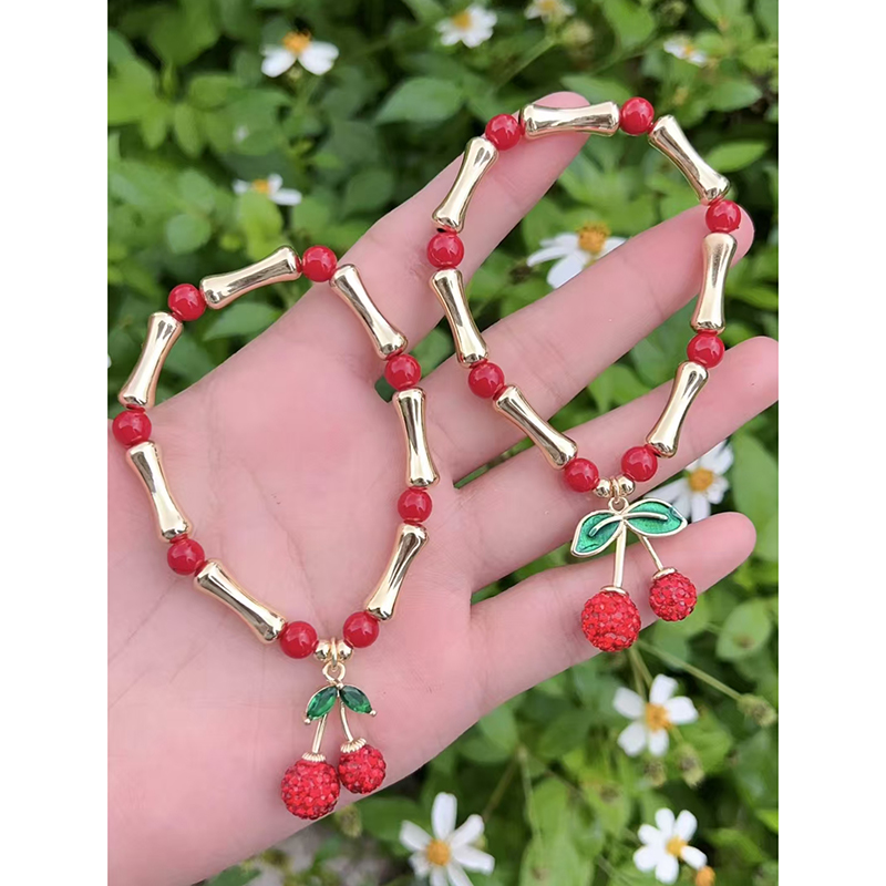 Pulsera De Cerezas Con Cuentas En Los Nudillos De Cobre Bañada En Oro