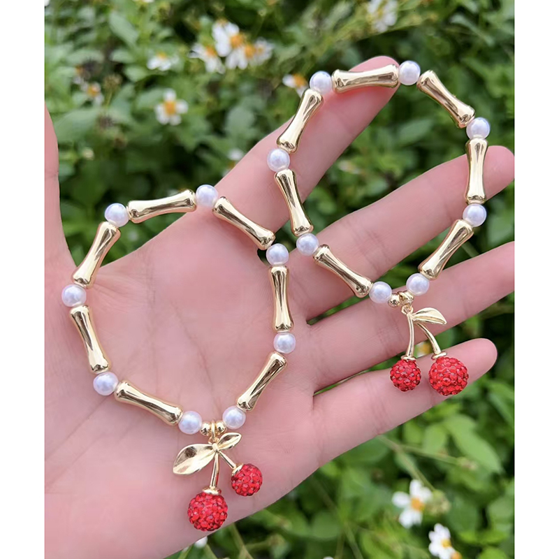 Pulsera De Cerezas Con Cuentas En Los Nudillos De Cobre Bañada En Oro