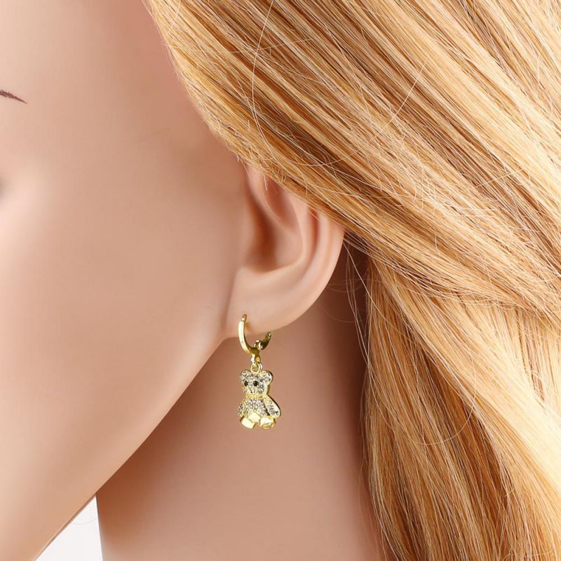 Pendientes De Elefante Con Oso Y Diamantes En Oro Y Cobre.
